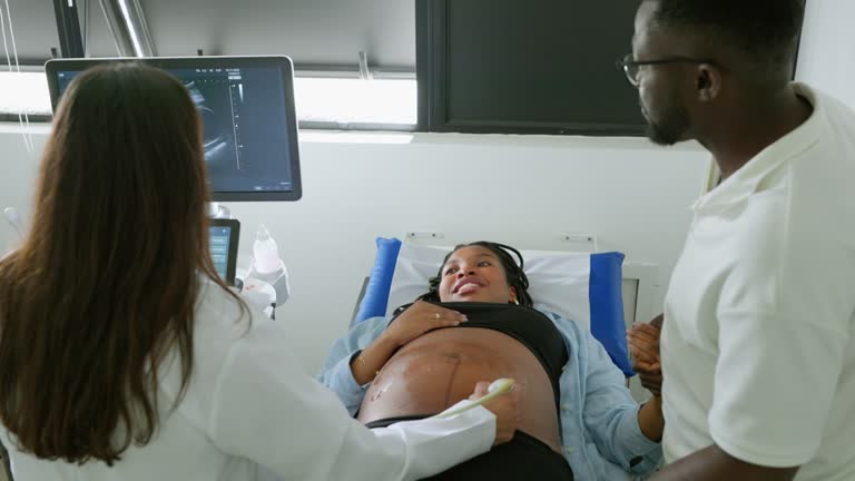 https://media.gettyimages.com/id/2247497821/video/black-woman-undergoing-prenatal-exam-with-her-husband.jpg?b=1&s=640x640&k=20&c=DH0A7_fhMo9MP2LWv6GKWD31o73tzjnP2j73mIP9WWo=