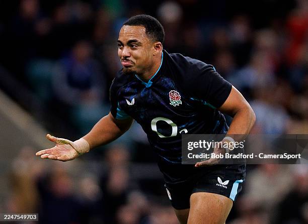 England's Max Ojomoh celebrates scoring his sides first try during the Quilter Nations Series 2025 rugby international match between England and...