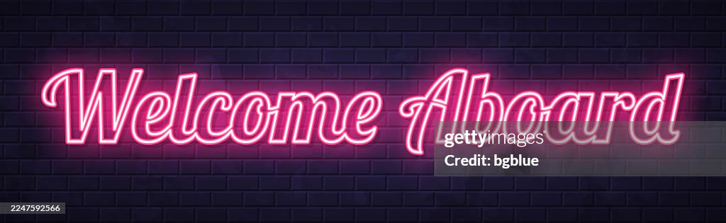 Welcome Aboard - Glowing neon text on brick wall background