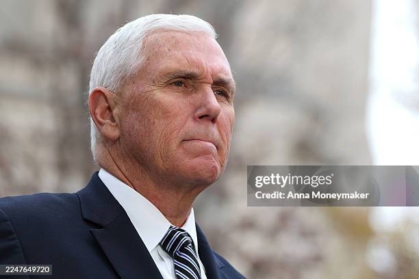 Former U.S. Vice President Mike Pence participates in a television interview outside of the funeral service of former Vice President Dick Cheney at...