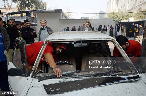 View of destruction after three suicide bombers attack headquarters of paramilitary force in northwestern Peshawar, Pakistan on November 24, 2025....