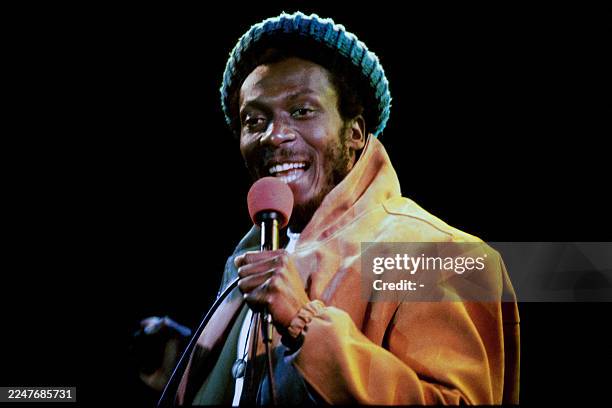 Portrait taken on February 1, 1984 in Paris shows Jamaican singer Jimmy Cliff singing during the radio programm Studio 1 on Europe 1. Jimmy Cliff is...