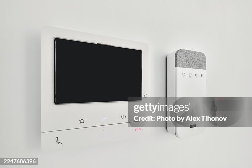 Modern home intercom with security control panel, closeup Modern home intercom with security control panel, closeup