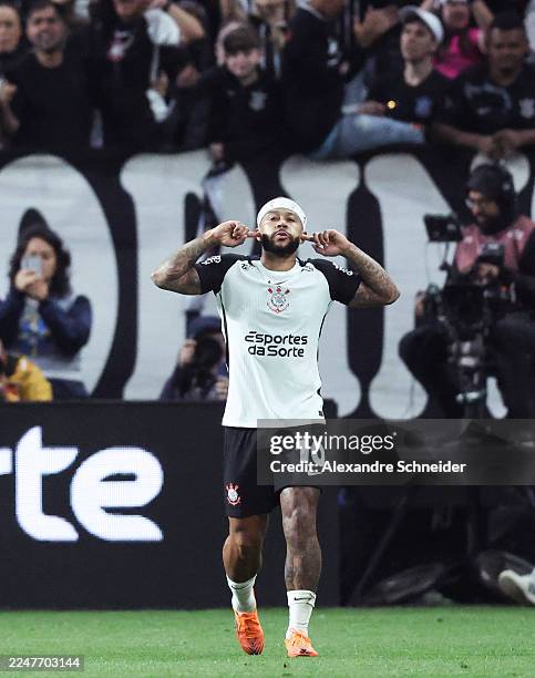 Memphis Depay of Corinthians celebrates after scoring the second goal of his team during a Brasileirao 2025 match between Corinthians and Sao Paulo...