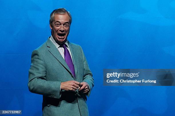 Reform UK Leader Nigel Farage attends a rally on November 24, 2025 in Llandudno, Wales. The rally comes days after Nathan Gill, former leader of The...
