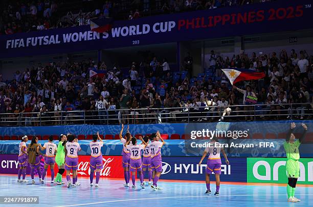 Players of Philippines acknowledge their fans after the team's defeat in the FIFA Futsal Women's World Cup - Group A match between Philippines and...