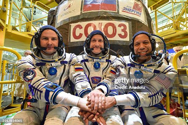Russian cosmonauts Sergey Kud-Sverchkov and Sergey Mikayev, along with NASA astronaut Christopher Williams are seen in the launch rocket that to...