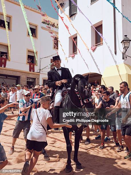 rider on horseback at a traditional spanish fiesta - virgen de la candelaria fiesta stock pictures, royalty-free photos & images