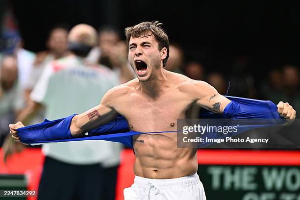 Flavio Cobolli of Italy celebrate against Zizou Bergs of Belgium during the Davis Cup Semi-Final match between Italy and Belgium at BolognaFiere...