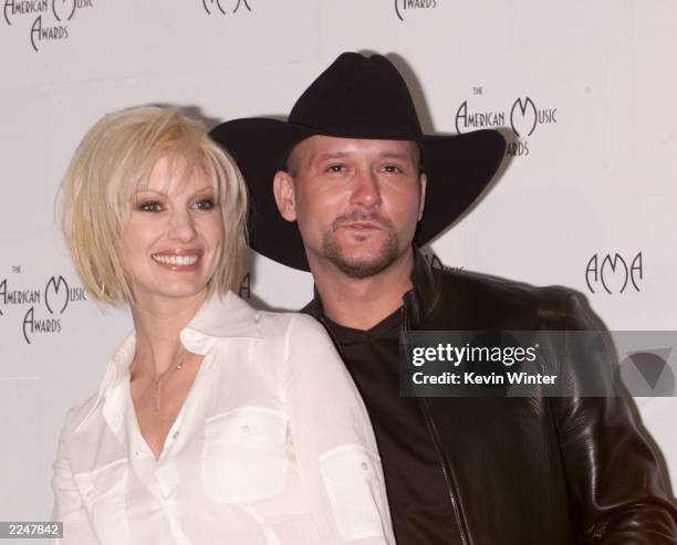 Faith Hill and Tim McGraw backstage at the 28th Annual American Music Awards at the Shrine Auditorium in Los Angeles Monday, Jan. 8, 2001. Photo by...