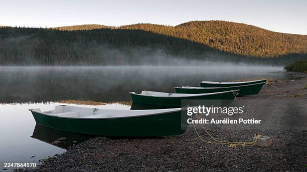 lac cascapédia, four boats - parc national de la gaspésie stock pictures, royalty-free photos & images