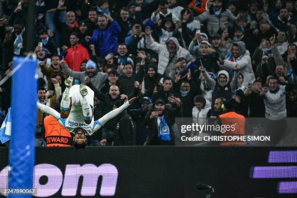Marseille's Gabonese forward Pierre-Emerick Aubameyang celebrates after scoring his team's second goal during the UEFA Champions League, league phase...