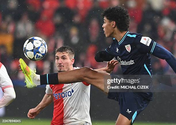 Slavia Prague's Czech midfielder Michal Sadilek and Athletic Bilbao's Spanish midfielder Selton Sanchez vie for the ball during the UEFA Champions...