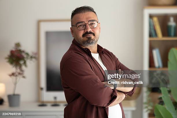portrait confident handsome man - turkish people stock pictures, royalty-free photos & images