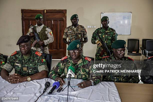 Brigadier General Denis N'Canha , head of the military office of the presidency gives a press conference at the General Staff of the Armed Forces on...