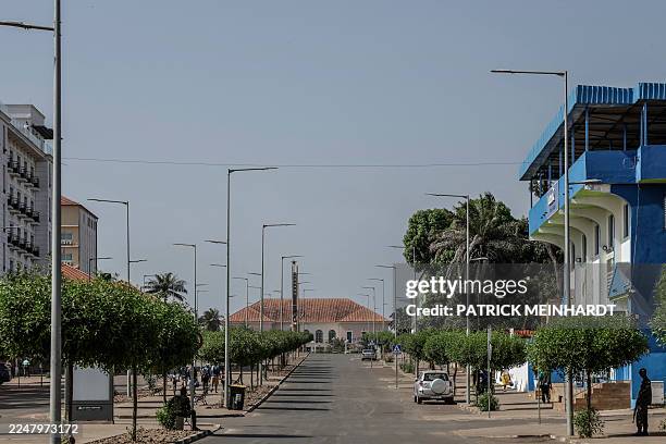 Genera view of a deserted street in Bissau on November 26, 2025 with the Presidential palace on the background. Gunfire was heard Wednesday outside...