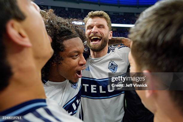 Jayden Nelson and Thomas Müller of Vancouver Whitecaps FC celebrate following the team's victory in the penalty shoot out during the conference...
