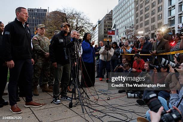 Director Kash Patel speaks alongside DC Mayor Bowser and fellow law enforcement officials to brief media members following a shooting near the...