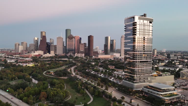 https://media.gettyimages.com/id/2248077234/video/houston-skyline-sunset-aerial-pan-over-river-oaks-and-buffalo-bayou.jpg?b=1&s=640x640&k=20&c=oswLgxfEA-9sh6__vUwtFoYFMp4oOnckfYuKVXKwR78=