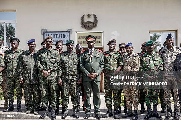 Guinea Bissau Army general Horta N'Tam poses with other military leaders after being sworn in as the transition leader and the leader of the High...