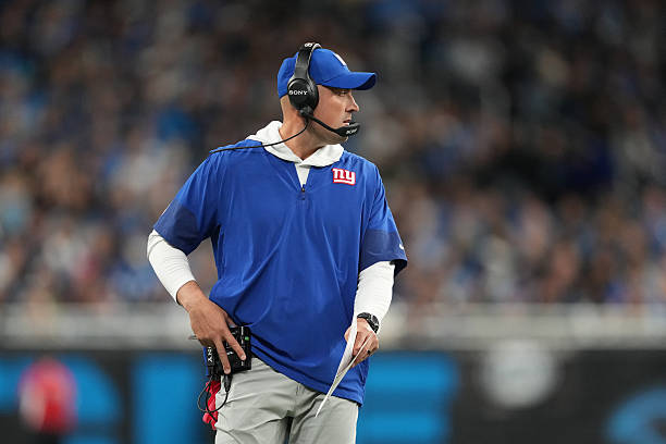 Head coach Mike Kafka of the New York Giants looks on during the first half against the Detroit Lions at Ford Field on November 23, 2025 in Detroit,...