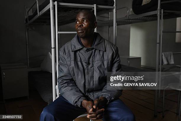 Kenyan national Evans Kibet, captured while fighting for Russian forces on the Ukrainian front, looks on during an AFP interview at a detention...
