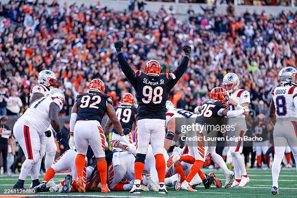 Slaton Jr. #98 of the Cincinnati Bengals celebrates during the third quarter of the NFL 2025 game against the New England Patriots at Paycor Stadium...