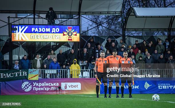 The referees line up before the Ukrainian Premier League match between FC Kolos Kovalivka and FC Dynamo Kyiv on November 22, 2025 in Kovalivka, Kyiv...
