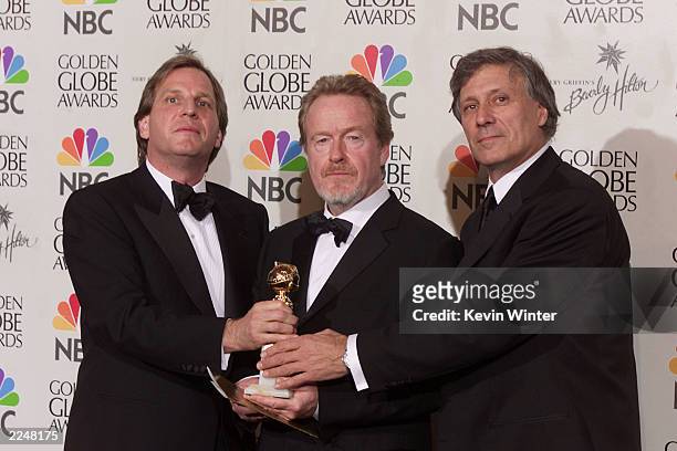 Director Ridley Scott and producers Doug Wick and David Franzoni with the award for Best Motion Picture? Drama for 'Gladiator' at the 58th Annual...