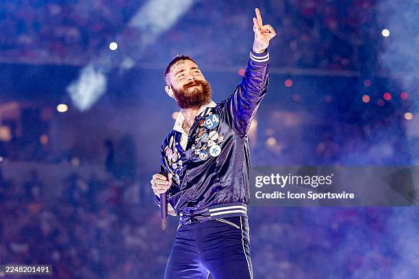 Singer-songwriter Post Malone entertains the crowd during halftime between the Dallas Cowboys and the Kansas City Chiefs on November 27, 2025 at AT&T...
