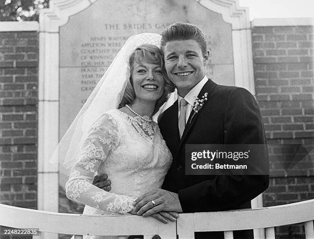 Newly-wed American actors June Blair and David Nelson posing after their wedding ceremony at Forest Lawn Memorial Park's Church of the Hills in Los...