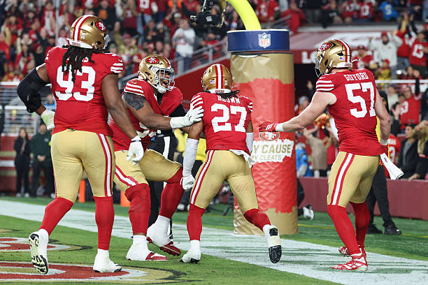 Ji'Ayir Brown of the San Francisco 49ers celebrates after making an interception in the end zone in the first quarter of the game against the...
