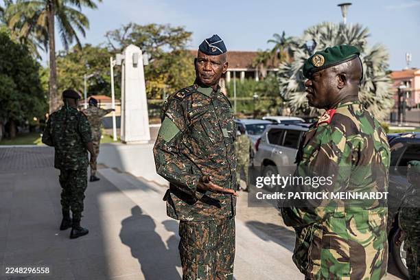 Chief of Staff of the Air Force Mama Saliu Emballo looks at the end of the swearing in ceremony at the Presidential Palace in Bissau, on November 28,...