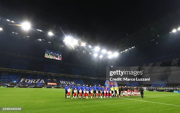 Milan and FC Internazionale teams line up during the Serie A match between FC Internazionale and AC Milan at Giuseppe Meazza Stadium on November 23,...