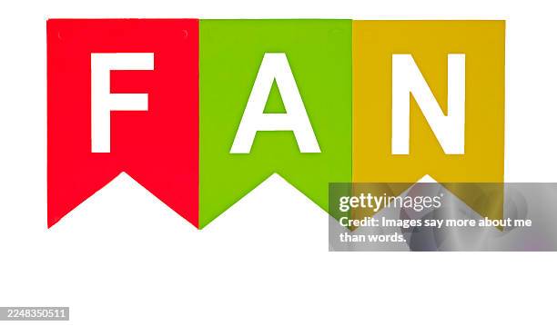 three colorful pennants spelling out the word fan. white backgro - words of support and encouragement stock pictures, royalty-free photos & images
