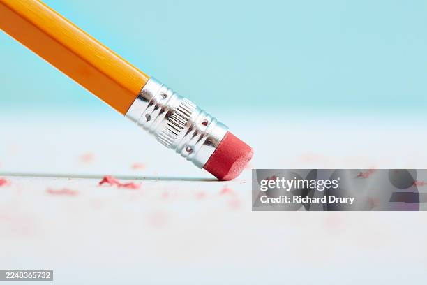 pencil eraser removing a mistake - misstag bildbanksfoton och bilder