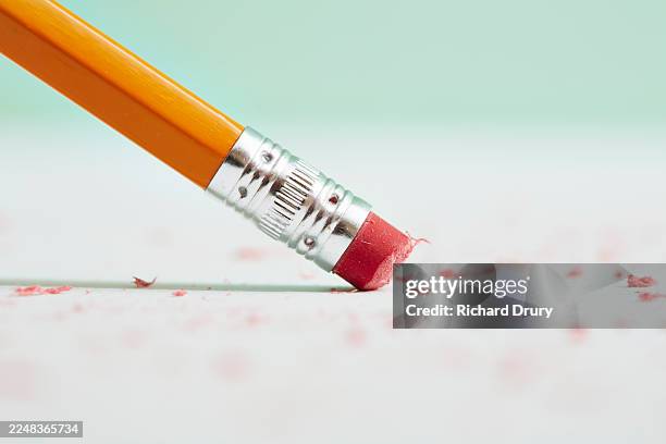 pencil eraser removing a mistake - cancel culture stock pictures, royalty-free photos & images