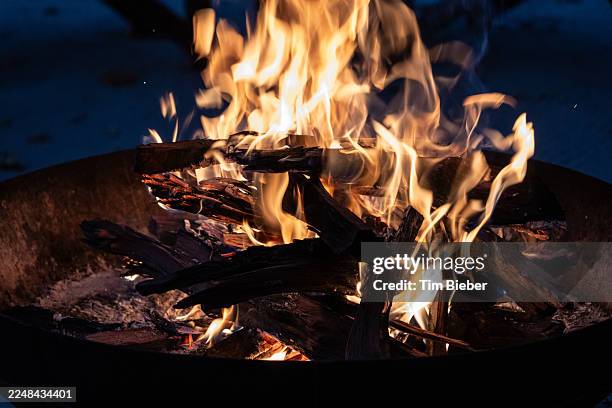 campfire burning. - camping botswana stock pictures, royalty-free photos & images