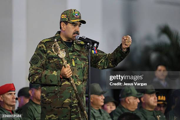 President of Venezuela Nicolás Maduro delivers a speech while holding the Venezuelan independence hero Simon Bolivar's 'Sword of Peru' during a...