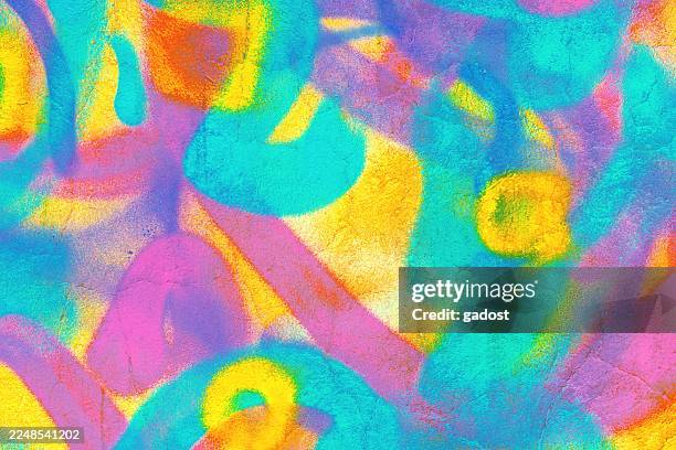 Vibrant Graffiti Swirl Pattern in Neon Blue, Pink, Yellow for Funky 80s Street Style