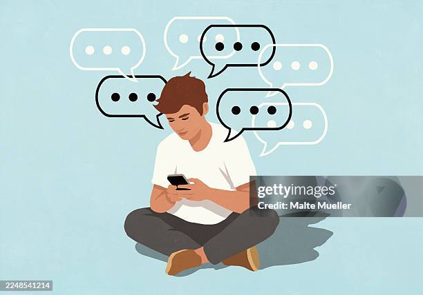 dot dot dot symbols in speech bubbles around man using smart phone against blue background - männlicher teenager stock-grafiken, -clipart, -cartoons und -symbole