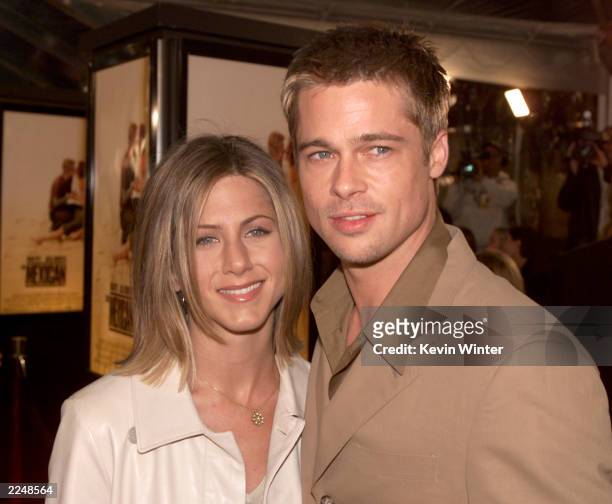 Brad Pitt and Jennifer Aniston at the premiere of 'The Mexican' at the National Theater in Los Angeles, Ca. 2/23/01. .