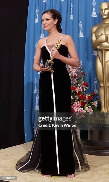 Julia Roberts, best actress winner for 'Erin Brockovich,' backstage at the 73rd Annual Academy Awards at the Shrine Auditorium in Los Angeles Sunday,...
