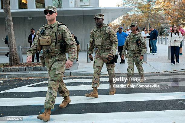Members of the National Guard respond to a shooting near the White House on November 26, 2025 in Washington, DC. According to reports, two members of...