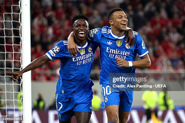 Kylian Mbappe of Real Madrid celebrates scoring his team's fourth goal with teammate Vinicius Junior during the UEFA Champions League 2025/26 League...