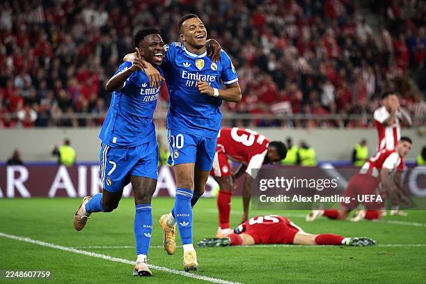 Kylian Mbappe of Real Madrid celebrates scoring his team's fourth goal with teammate Vinicius Junior during the UEFA Champions League 2025/26 League...