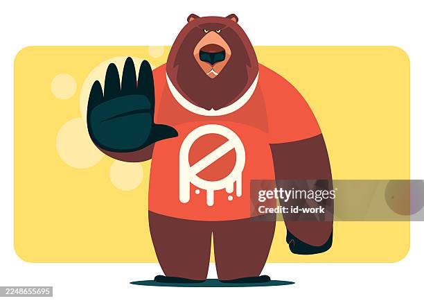 angry bear gesturing stop sign in red t-shirt - bear standing stock illustrations