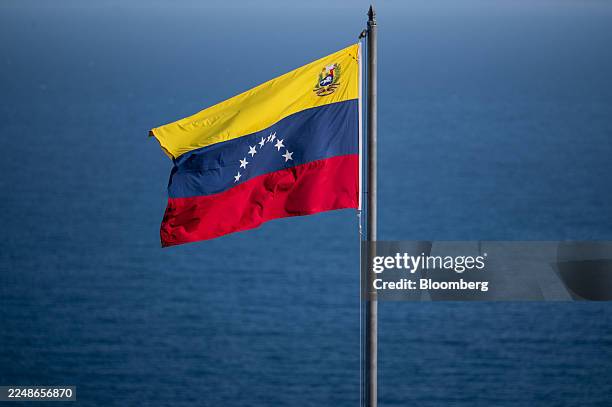 Venezuelan flag in La Guaira, Vargas State, Venezuela, on Sunday, Nov. 30, 2025. President Donald Trump said airlines should consider the airspace...