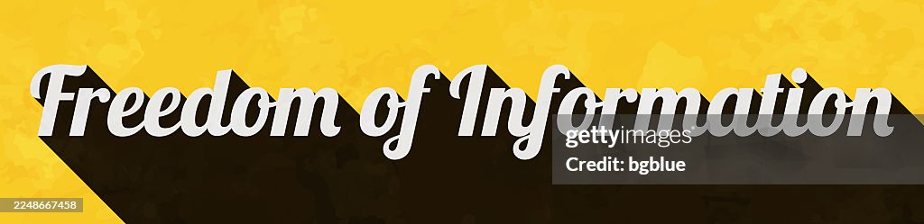 Freedom of Information - Text with long shadow on textured yellow background