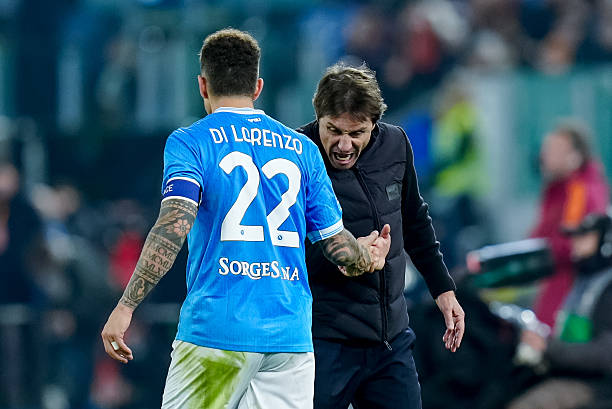 Antonio Conte Head Coach of SSC Napoli celebrates with Giovanni Di Lorenzo during the Serie A Enilive match between AS Roma and SSC Napoli at Stadio...